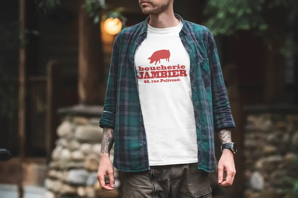 Boucherie_Jambier_mockup-of-a-tattooed-man-wearing-a-t-shirt-outside-1847-el1.webp